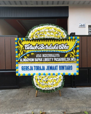 Papan Bunga Duka di Anaiwoi